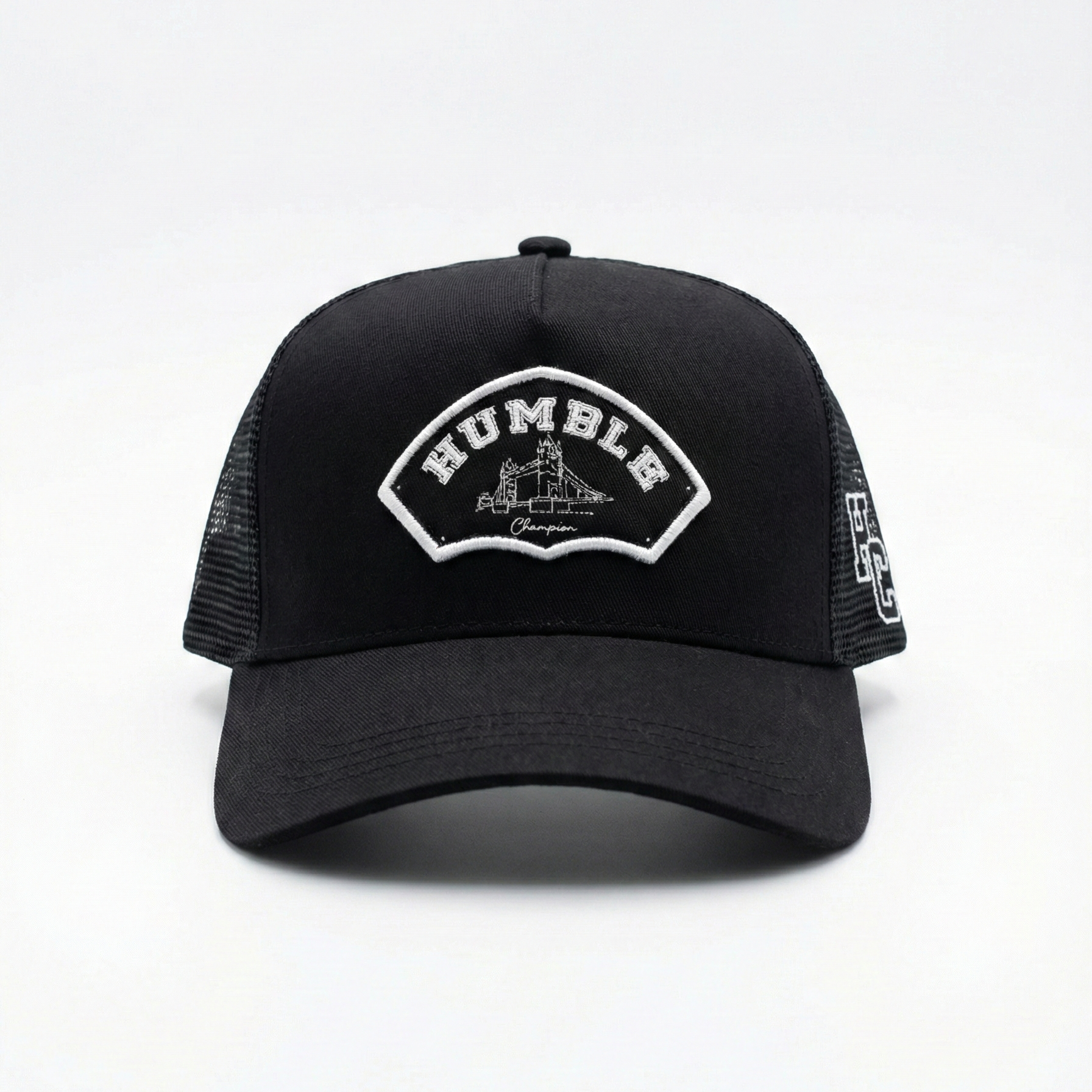 Black mesh trucker cap with 'Humble' logo