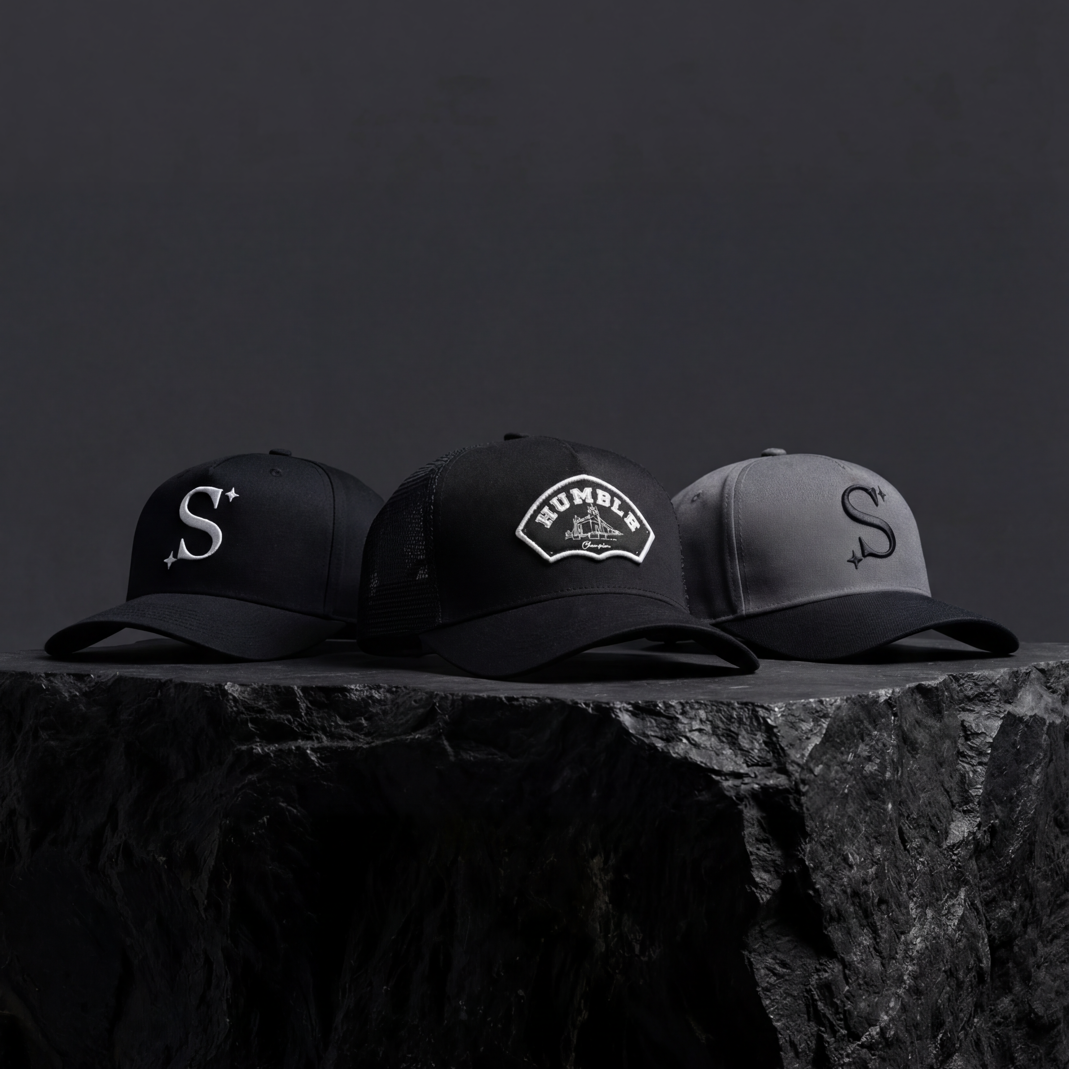 Three trucker caps with logos