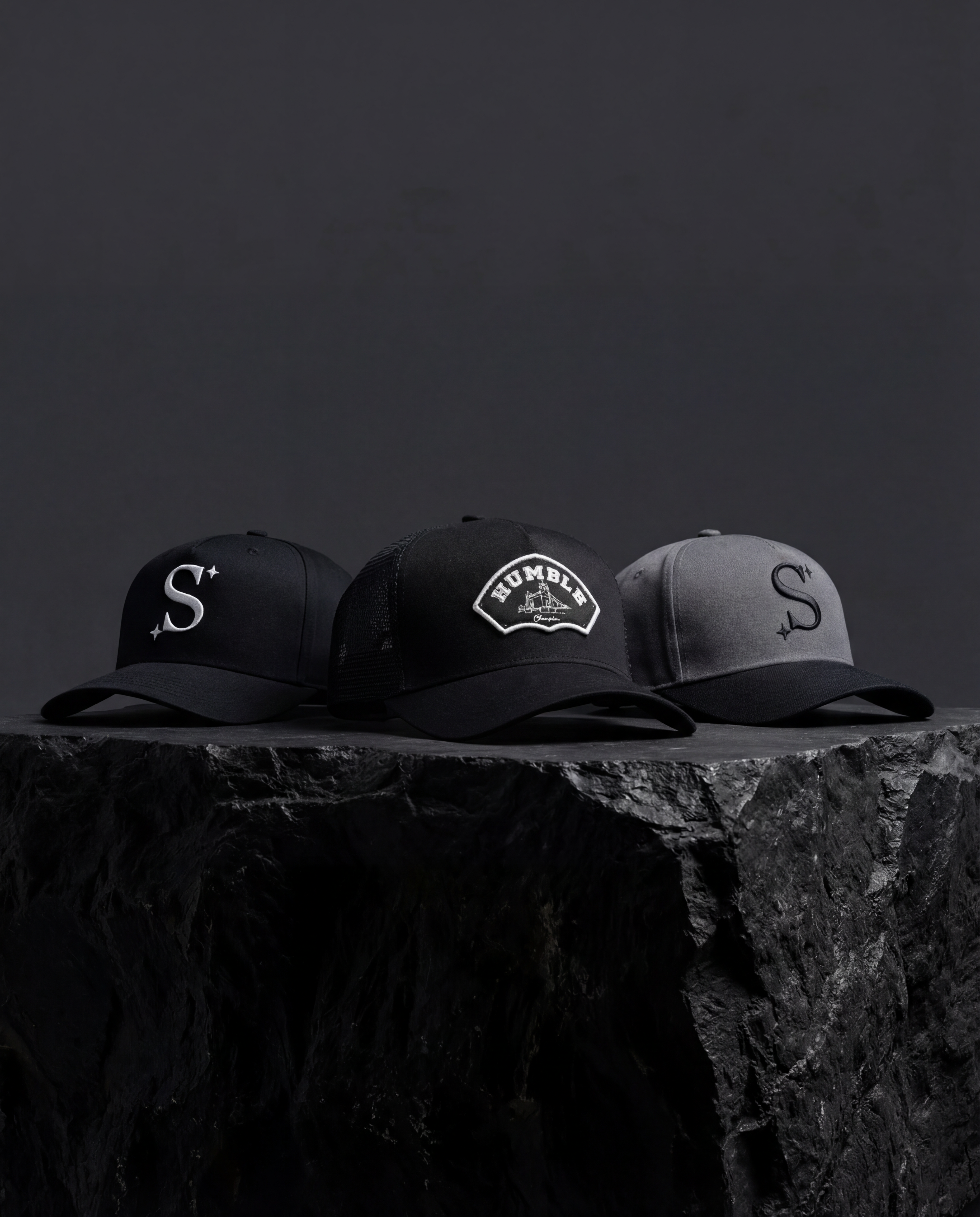 Three trucker caps with logos