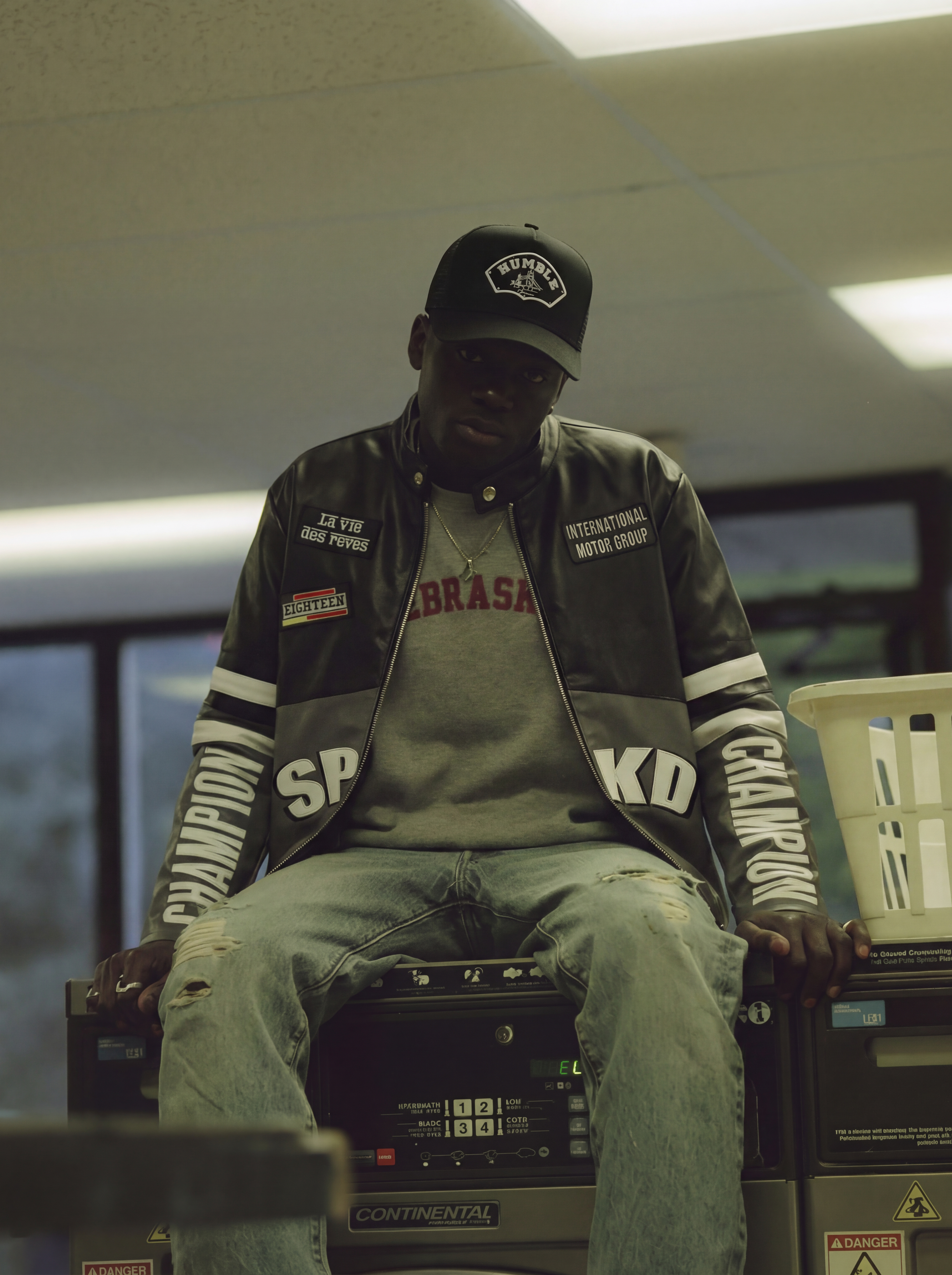 person wearing a black trucker cap