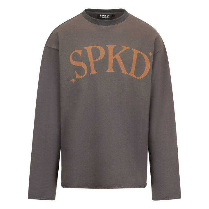 charcoal essential jumper with burnt orange logo reading SPKD with stars