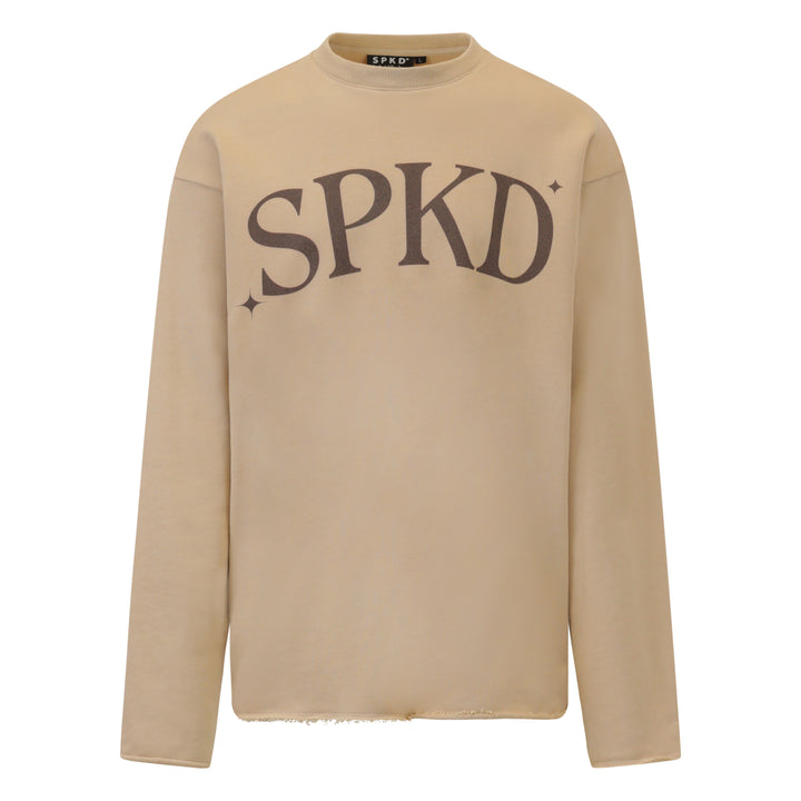 beige essential jumper with brown logo reading SPKD with stars