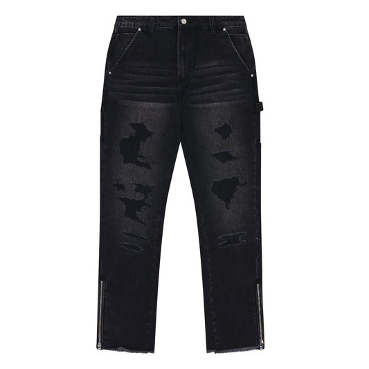 Black distressed jeans on a white background