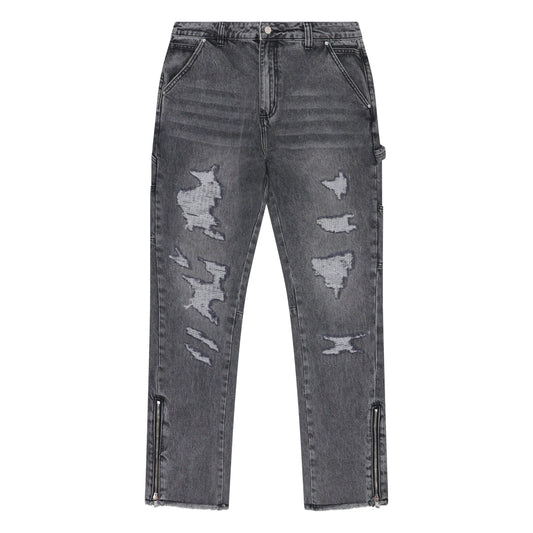 Distressed grey jeans on a white background