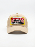 Beige cap with a colourful patch 