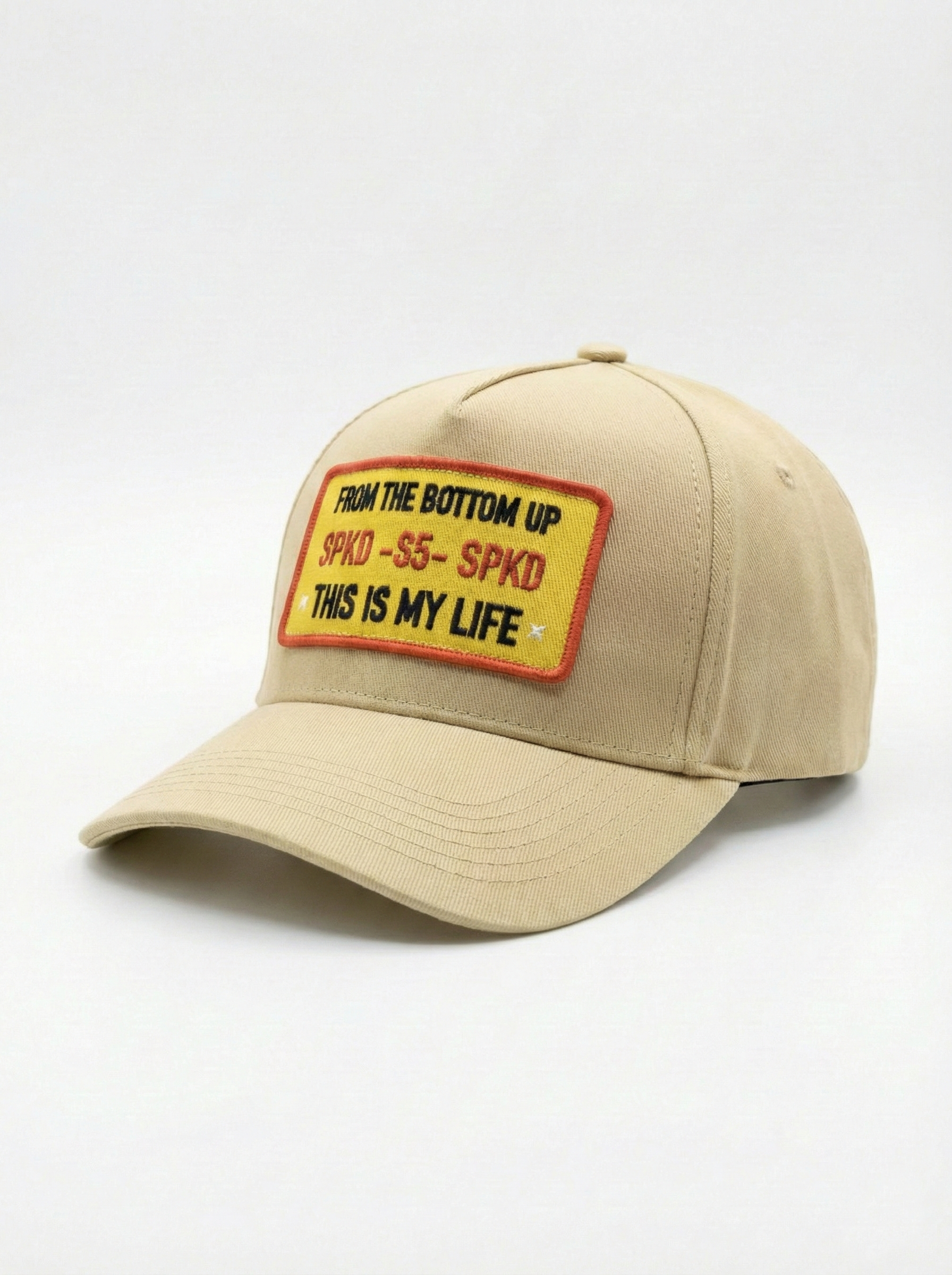 beige trucker cap with a patch logo