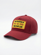 Red trucker cap with a patch logo
